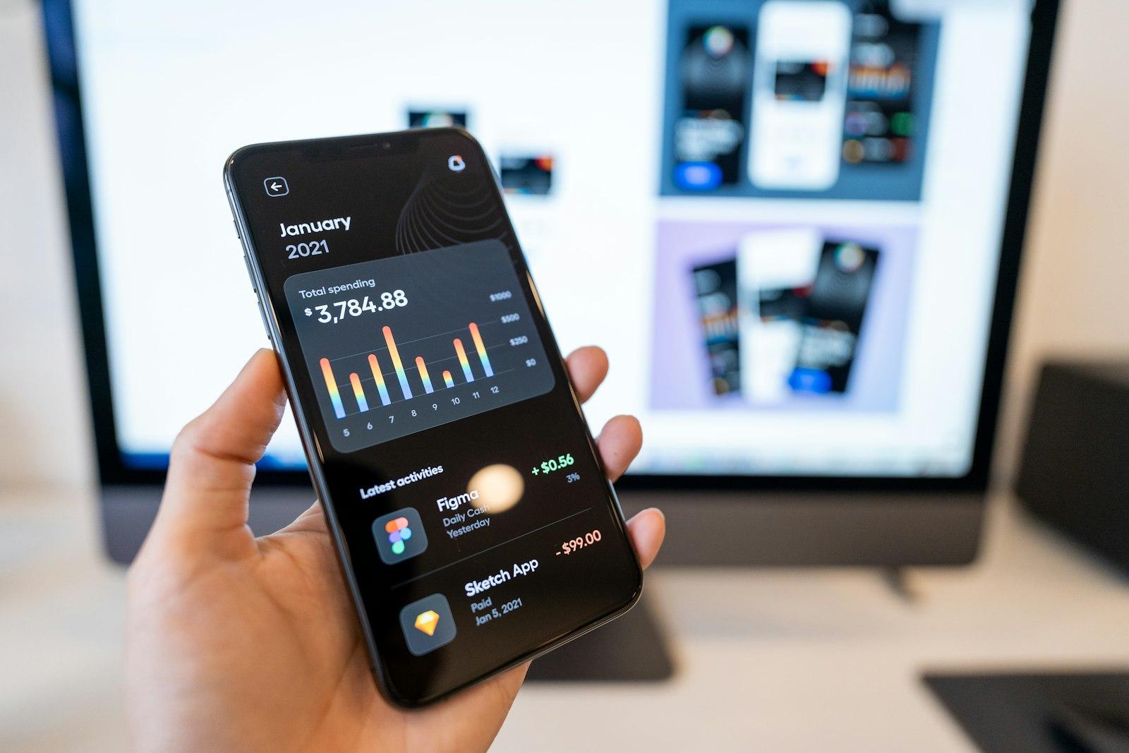 A hand holding an Android phone